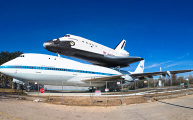 The 747 that carried the space shuttle cross country and the Independence mock up on the back