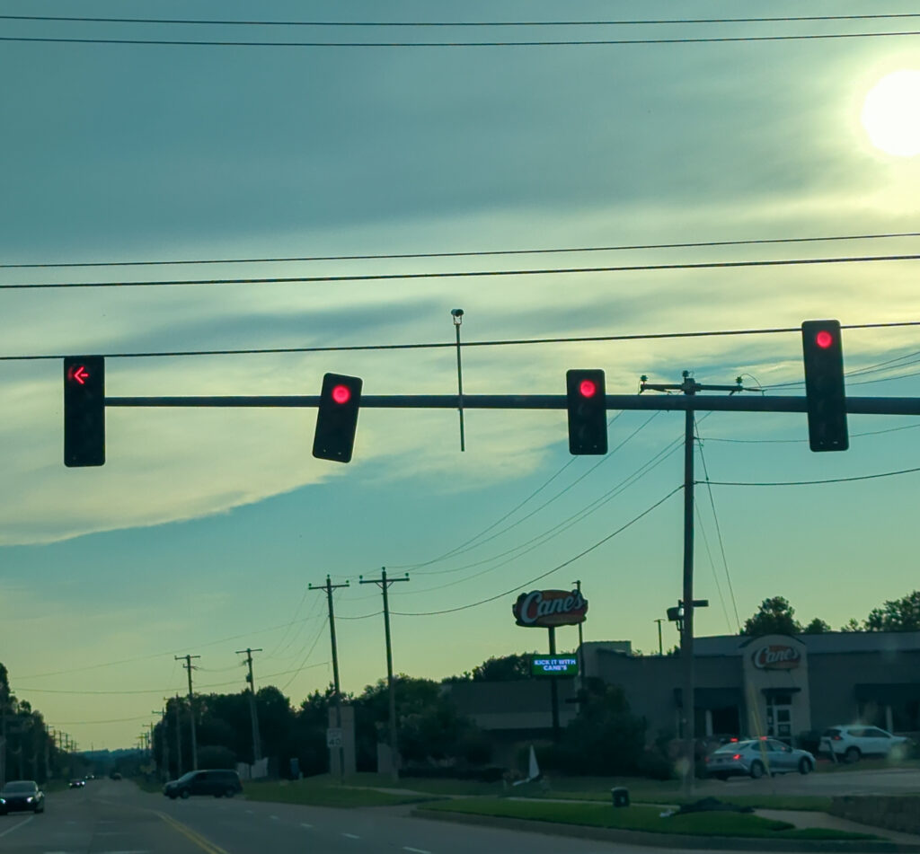 Stoplight in West Norman blown crooked by storm